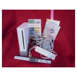 Nintendo Wii with controller and games