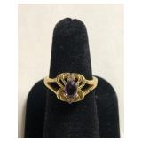 Gold Colored Ring with Purple Stone