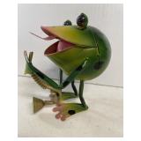 Metal Frog holding a Saxophone