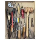 Box of tools hammer cutter flies and more