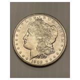 1902 O BU Morgan Silver Dollar