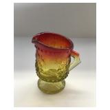 Thick Red and Golden Yellow small creamer with han