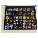 Display Case Full of Vintage Glass Marbles
