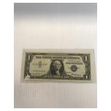 1957 Blue Seal One Dollar Silver Cent