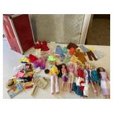 Red Doll case with Barbies and other dolls clothes