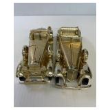 2-Golden Packard Cars