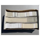 lot of 3000 mixed date/sport trading cards