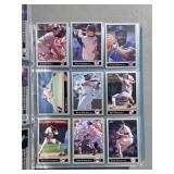 large binder full of mixed sports cards