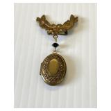 Brooch with locket