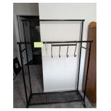 Black Metal Clothes Hanging Rack. 63x15x43. Adjust