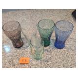 5 multi colored Coca Cola glassware
