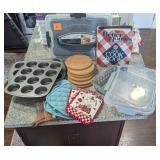 Variety of kitchen baking supplies and cookbook