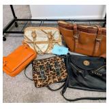 5 Handbags. Gently used