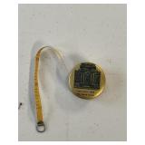 VINTAGE SEWING TAPE MEASURE - DOLLAR BANK