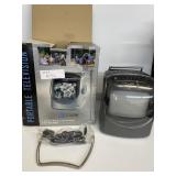 5" PORTABLE TV B/W WITH AM/FM RADIO 2002; KAUFMANS