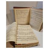 Large binder filled with vintage music sheets