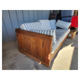 Wooden frame sofa with cushions