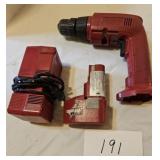 Milwaukee drill battery and charger Milwaukee drill battery and charger