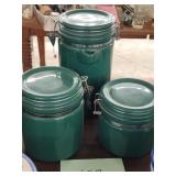 3 green ceramic canisters