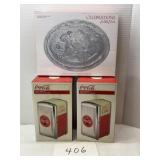 (2) COCA COLA NAPKIN DISPENSERS & NATIVITY PLATE