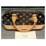 Louis Vuitton Small purse not authentic