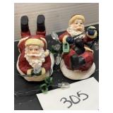 Ceramic Santa decor tangled in lights