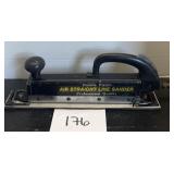 Double piston air straight line sander