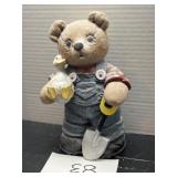 Teddy bear with duck and shovel garden decor