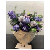Faux bouquet in beautiful bow vase