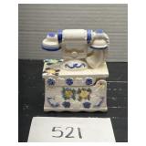 Decorative phone box in vintage old earthenware