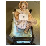 Vintage Porcelain Doll in Wooden Basinette