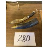 Curved knife with scabbard
