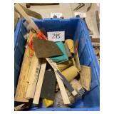 Assorted items, sandpaper paint, stirrers