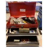 Metal toolbox with assorted items