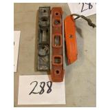 Two levels and utility knife