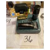 Black suede cologne after shade balm, and