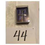 Hand polished cross necklace