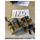 Open bail fishing reels two pieces