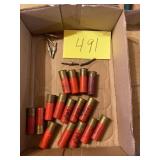 12 gauge shotgun shells and practice arrow tips