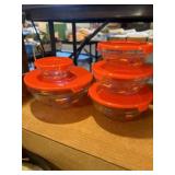 Five piece glass bowl set with lids