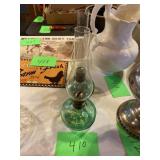 Green glass oil lamps two pieces