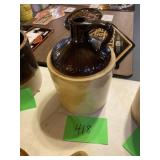 Brown, and white glazed jugs