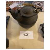 Cast iron tea kettle