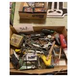 Miscellaneous tools, screws, spark plugs, tape