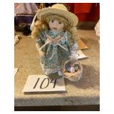 Porcelain doll with Easter basket