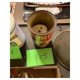 Calumet baking powder tin with cookie cutters