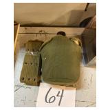Metal canteen with cover and web belt