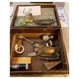 Assorted items in wooden box