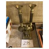 Brass pieces, candlesticks, and stat