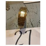 Fancy gold womenï¿½s watch bracelet